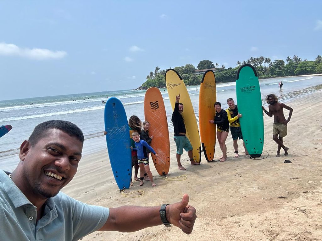 A surf lesson group on Hikkaduwa Beach — Hikkaduwa Beach